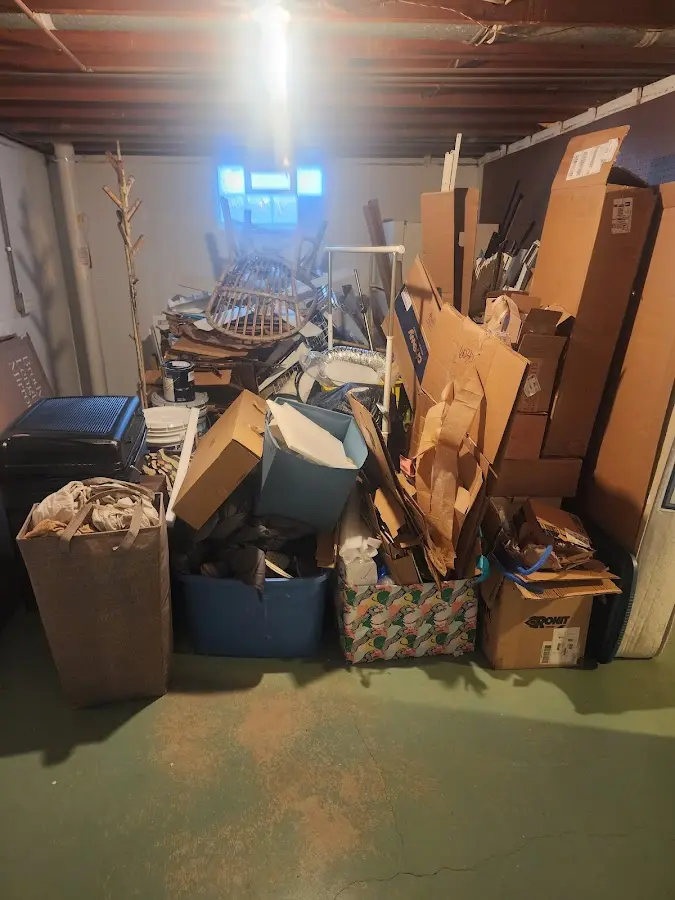 Roll-off dumpster container at job site for 20 Yard Dumpster Rental in Cecil